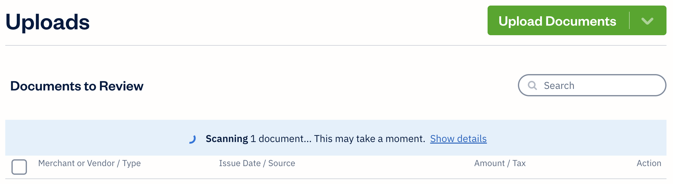 Scanning documents banner above list of uploads.